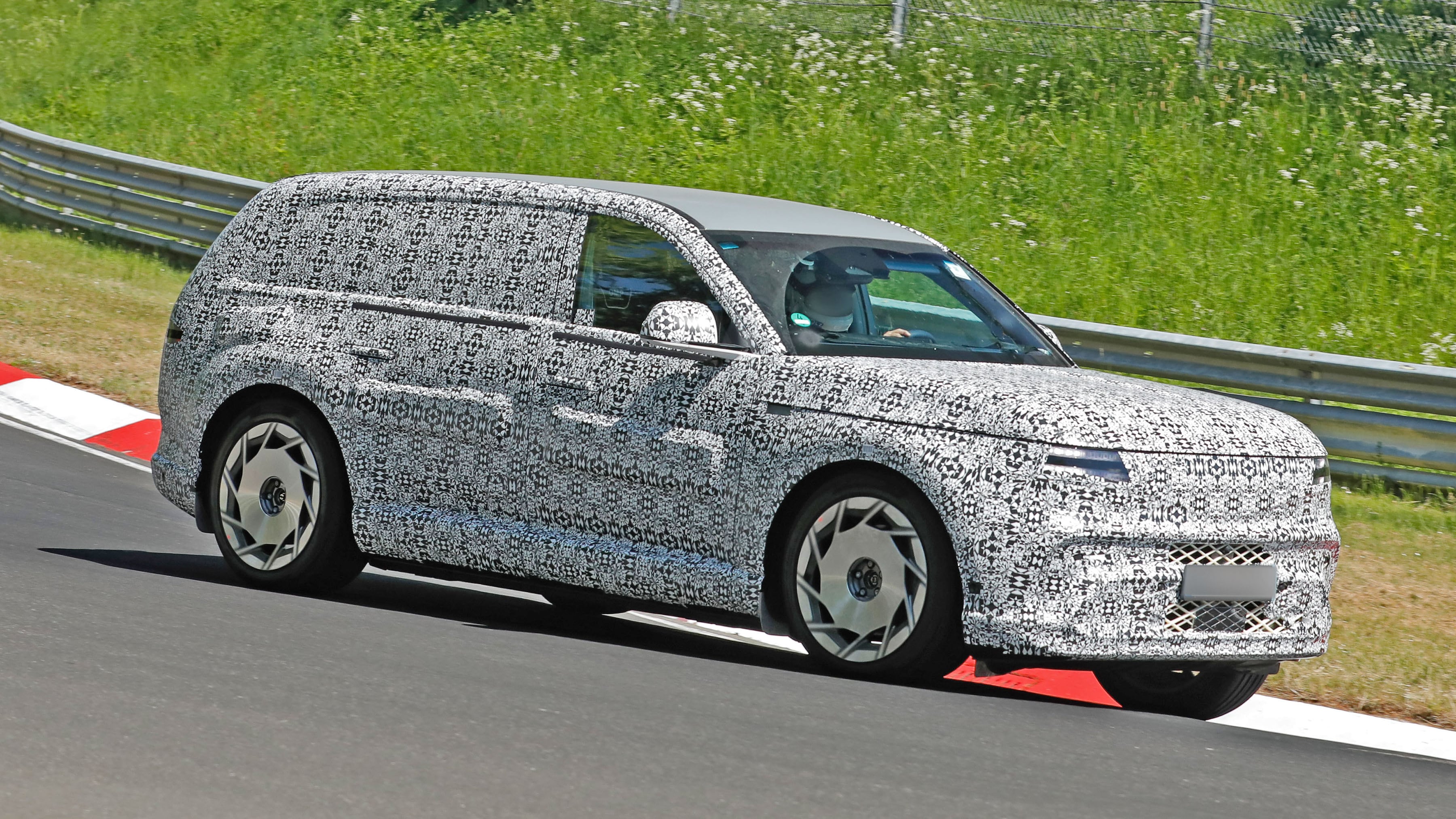Genesis flagship EV prototype spied running laps at the Nürburgring